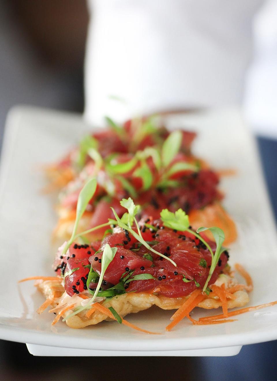 The tuna crisps at Buccan maintained their status as one of the restaurant's most popular menu items in 2023.