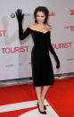 Angelina wore an unsual Versace velvet dress with built-in gloves to the 2010 Berlin premiere of The Tourist.