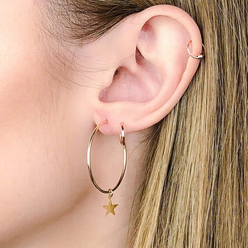 <strong><a href="https://fave.co/2ZV6Cn2" target="_blank" rel="noopener noreferrer">Find these earrings starting at $27 from the Delicate Layers shop on Etsy</a>.</strong>