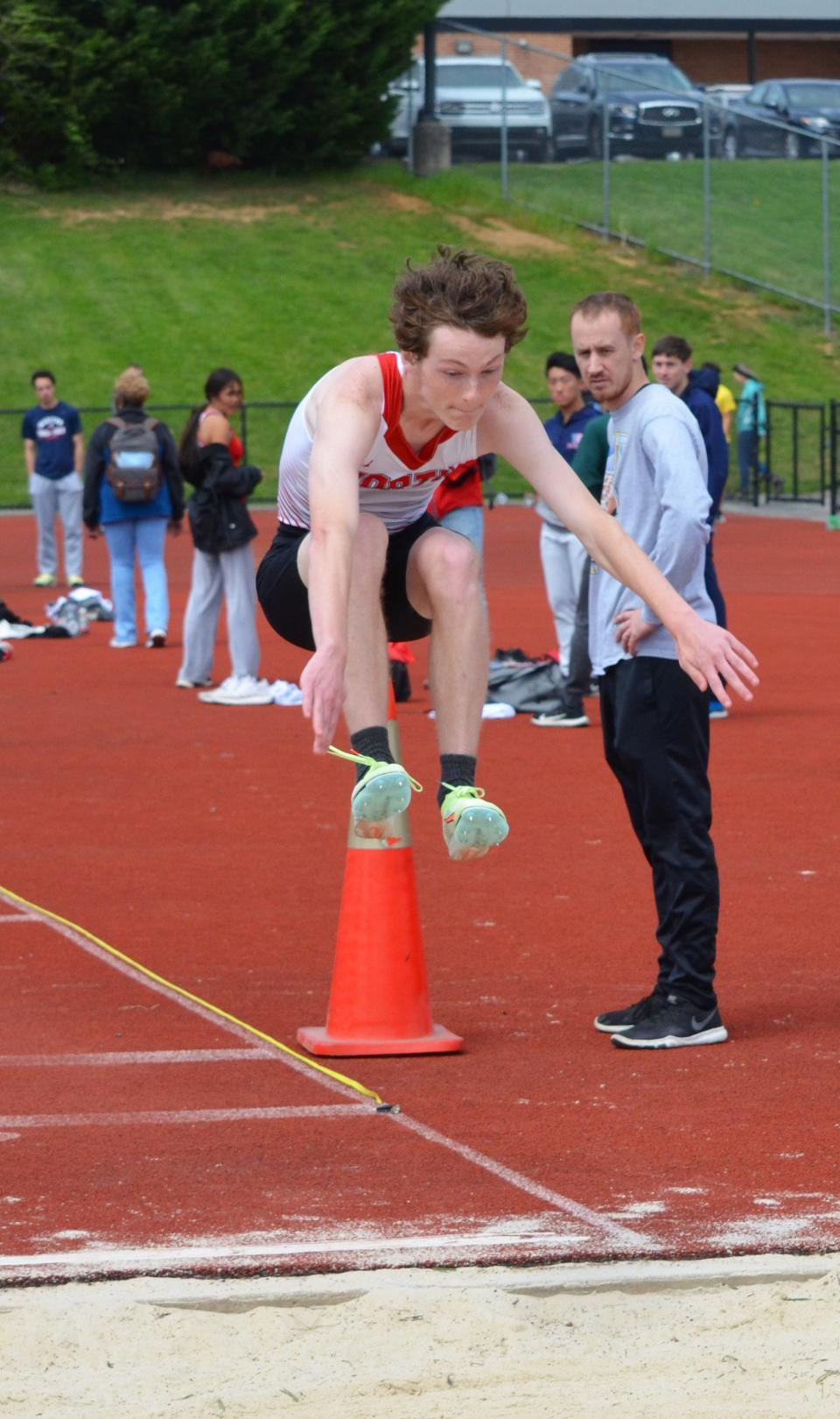 North Hagerstown's Jake Scallion competes in the long jump as part of the boys tetrathlon at the Chuck Zonis Track & Field Invitational at North. Scallion scored 30 points to win the event, which also included the 200, 800 and discus.