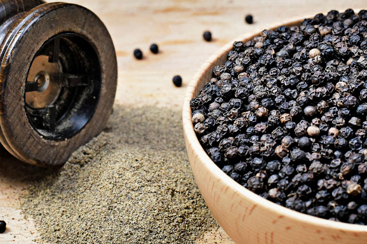 Black peppercorns and milled pepper Getty Images/Eivaisla