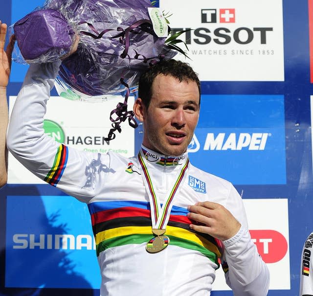 Mark Cavendish wears the rainbow jersey after winning in Copenhagen