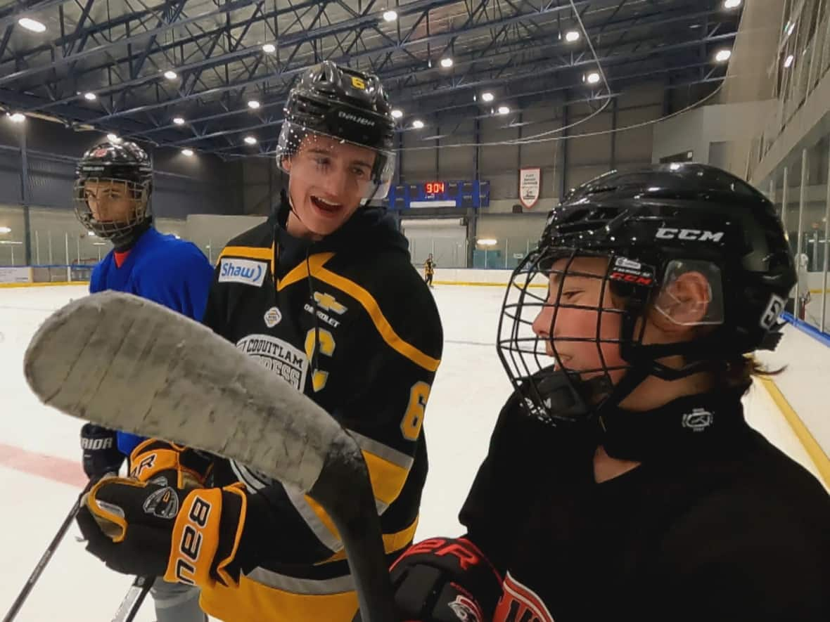 Ian Devlin, captain of the BCHL's Coquitlam Express, says volunteering with minor hockey teams helps him develop perspective and a new way of viewing the world. He says it is making him a better person. (Justin Pennell/CBC - image credit)