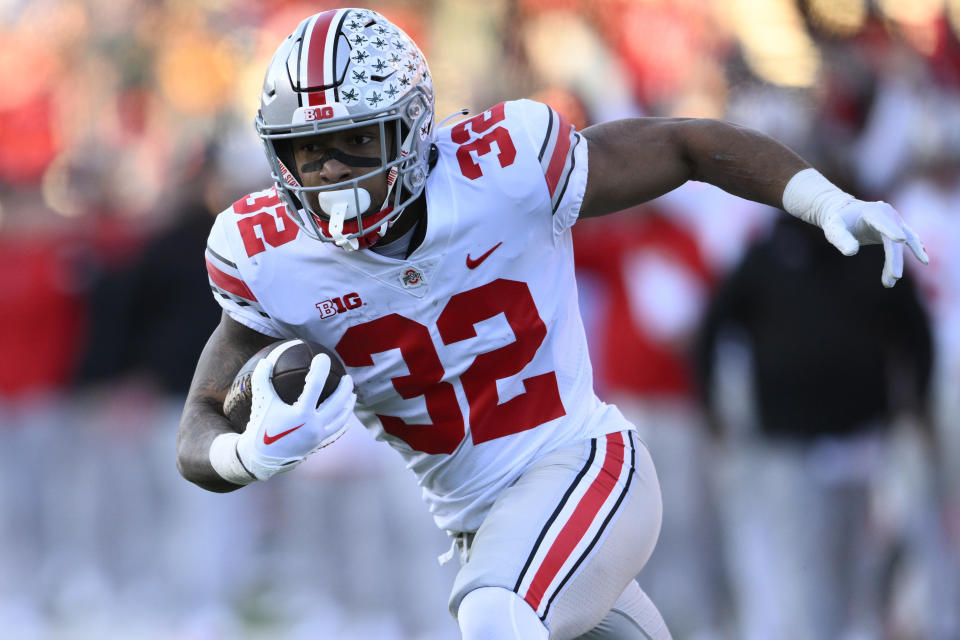 FILE - Ohio State running back TreVeyon Henderson (32) carries the ball during the first half of an NCAA college football game against Maryland, Saturday, Nov. 19, 2022, in College Park, Md. Ohio State opens their season on Sept. 2 at Indiana. (AP Photo/Nick Wass, File)