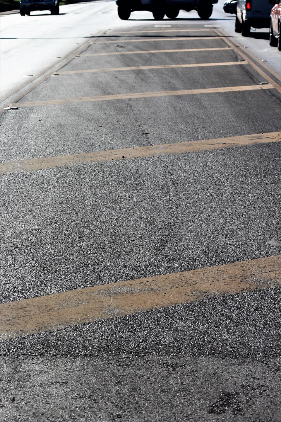 Normally, yellow striping on a road indicates a no traffic zone. In Abilene, it can be used as a turn lane and is used, judging by the tire marks on the pavement at South First Street and Sayles Boulevard. June 28 2023