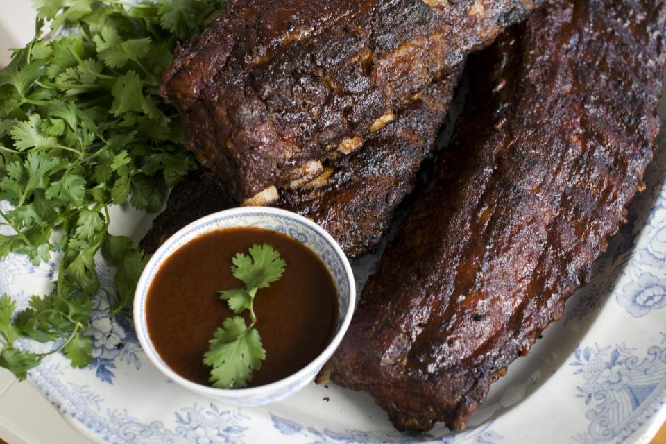 In this image taken on June 3, 2013, Bubba’s Bunch barbecued baby back ribs are shown in Concord, N.H. (AP Photo/Matthew Mead)