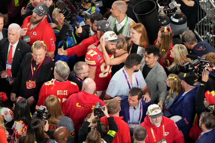 Kansas City Chiefs tight end Travis Kelce (87) hugs his girlfriend Taylor Swift after the team’s victory over the San Francisco 49ers during the NFL Super Bowl 58 football game Sunday, Feb. 11, 2024, in Las Vegas. (AP Photo/David J. Phillip)