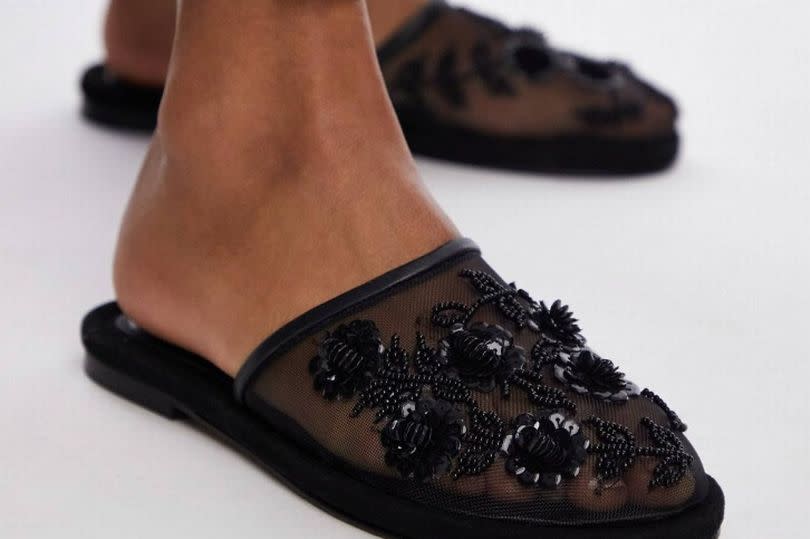 Black beaded sandals on ASOS website