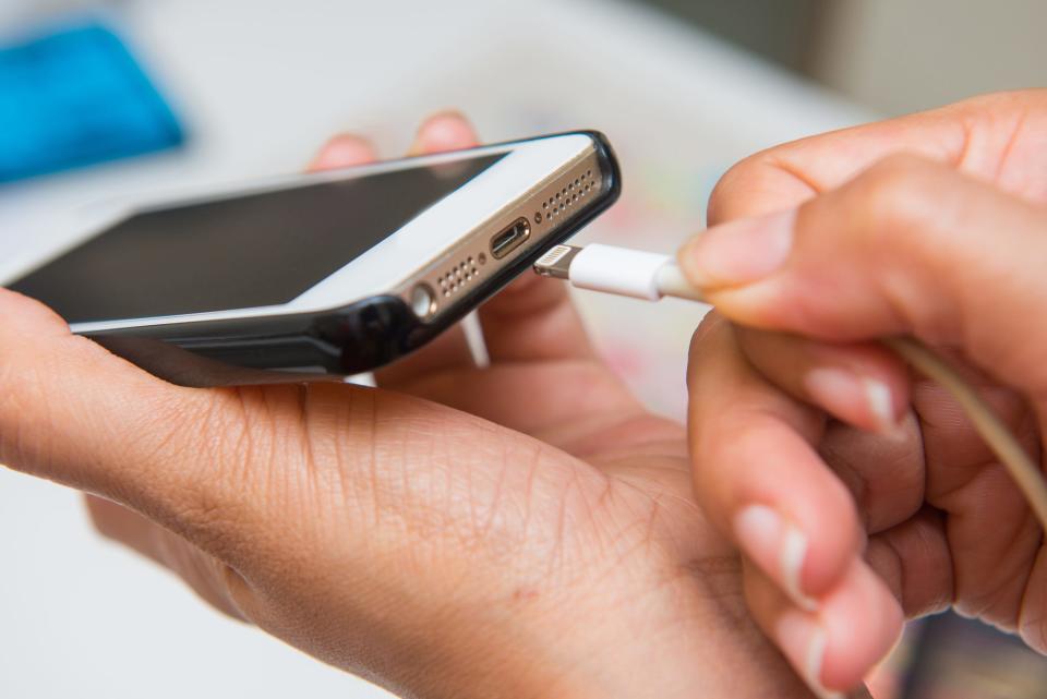 charging iphone close up