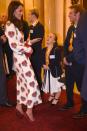 <p>Alexander McQueen proved to be a favourite label for the Duchess again this year with the royal wearing a poppy-printed design to meet members of Team GB. Ever the co-ordinator, Kate chose matching red accessories. <i>[Photo: PA]</i> </p>