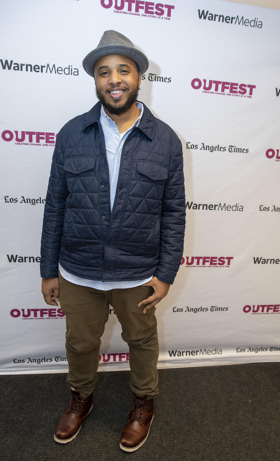 Justin Simien posing