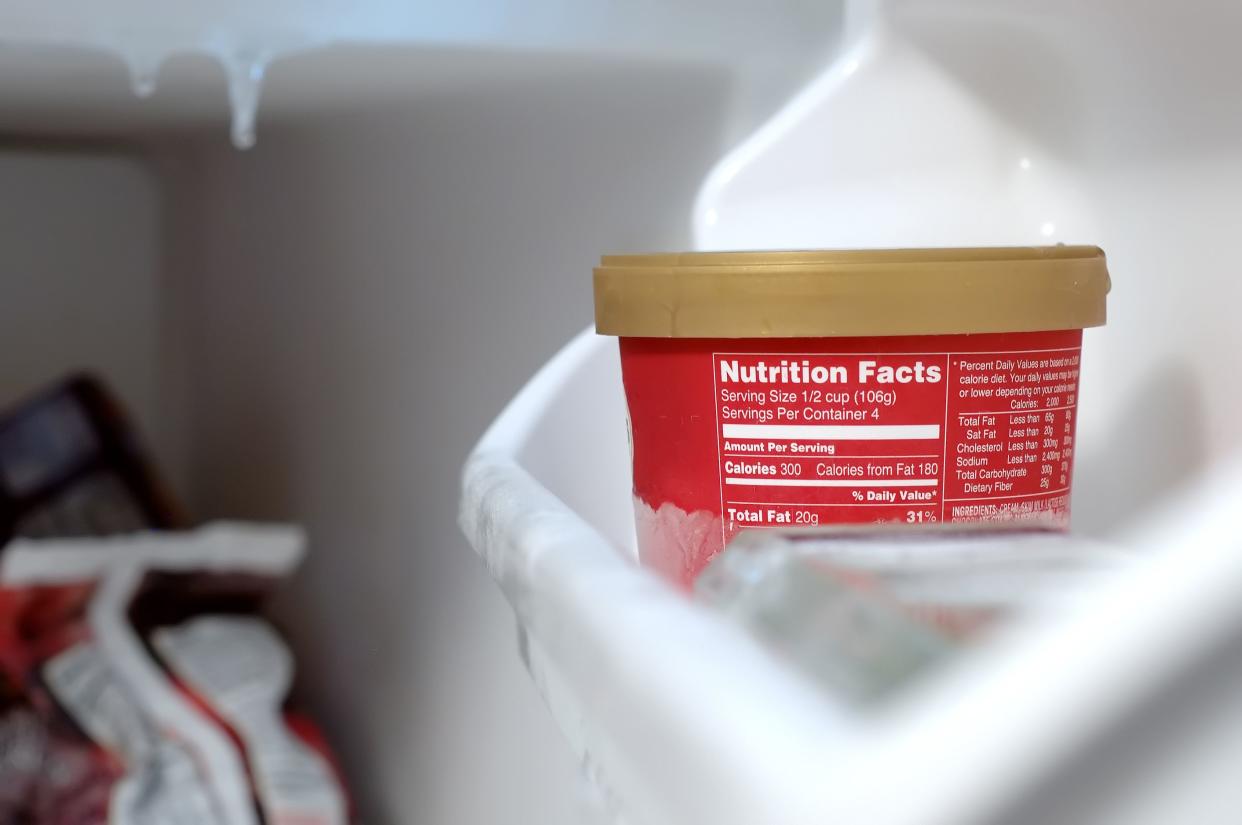 Pint of ice-cream on a shelf in a freezer