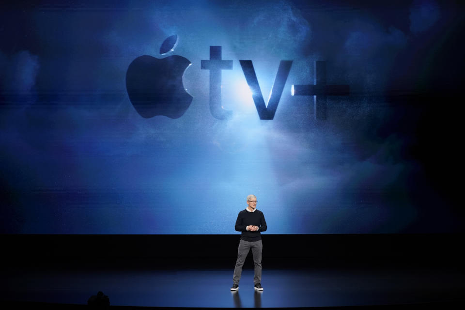 FILE - In this Monday, March 25, 2019, file photo, Apple CEO Tim Cook speaks at the Steve Jobs Theater during an event to announce new products, including Apple's steaming TV, in Cupertino, Calif. Streaming services ranging from Netflix to Amazon to Disney+ and others want us to stop sharing passwords. That's the new edict from the giants of streaming media, who are looking to discourage the common practice of sharing account passwords without alienating subscribers who've grown accustomed to the hack. (AP Photo/Tony Avelar, File)