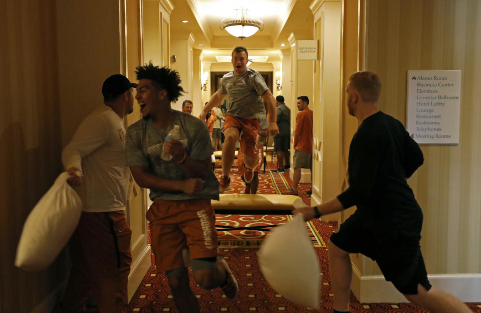 Texas Longhorns' Sam Ehlinger and teammates run through an obstacle course at the team hotel Saturday Sept. 7, 2019 Austin, Tx. ( Photo by Edward A. Ornelas )