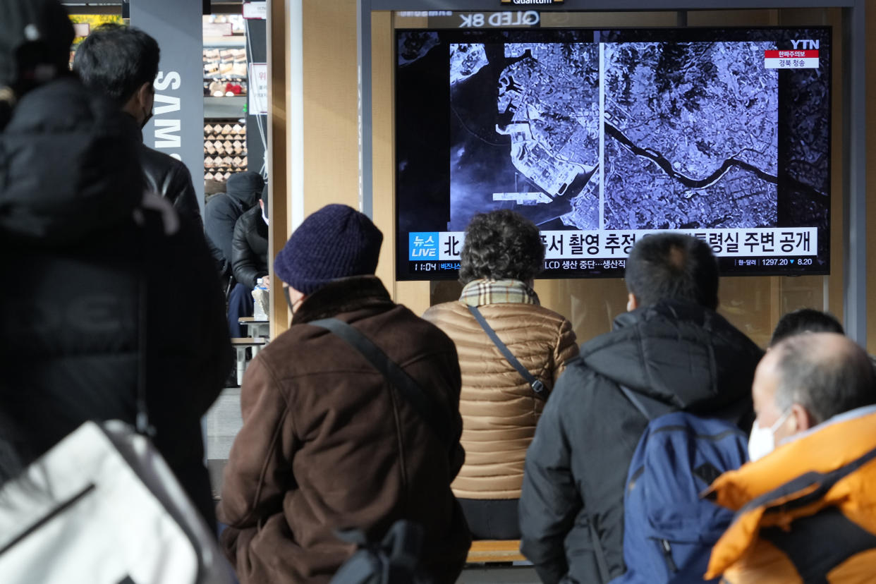 A TV screen shows images showing a space view of the South Korean capital and Incheon, left, during a news program at the Seoul Railway Station in Seoul, South Korea, Monday, Dec. 19, 2022. (Ahn Young-joon/AP)