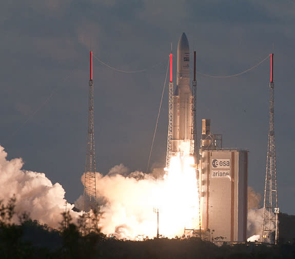 An Ariane 5 ascends from French Guiana at sunset with the EchoStar 17 and MSG-3 satellite payloads into orbit from Guiana Space Center in Kourou, French Guiana. Liftoff occurred on July 5, 2012.