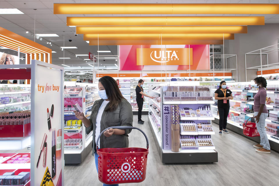 This photo provided by Target shows the Ultra Beauty inside Target department store in Edina, Minn., on Aug. 14, 2021. Americans are splurging on beauty as they tighten their budgets elsewhere. According to market research company IRI, sales of eye, face and lip makeup has gone up across stores. It comes as major retailers slashed their financial outlooks for the year after seeing shoppers pull back on many discretionary items in the latest quarter. (Target via AP)