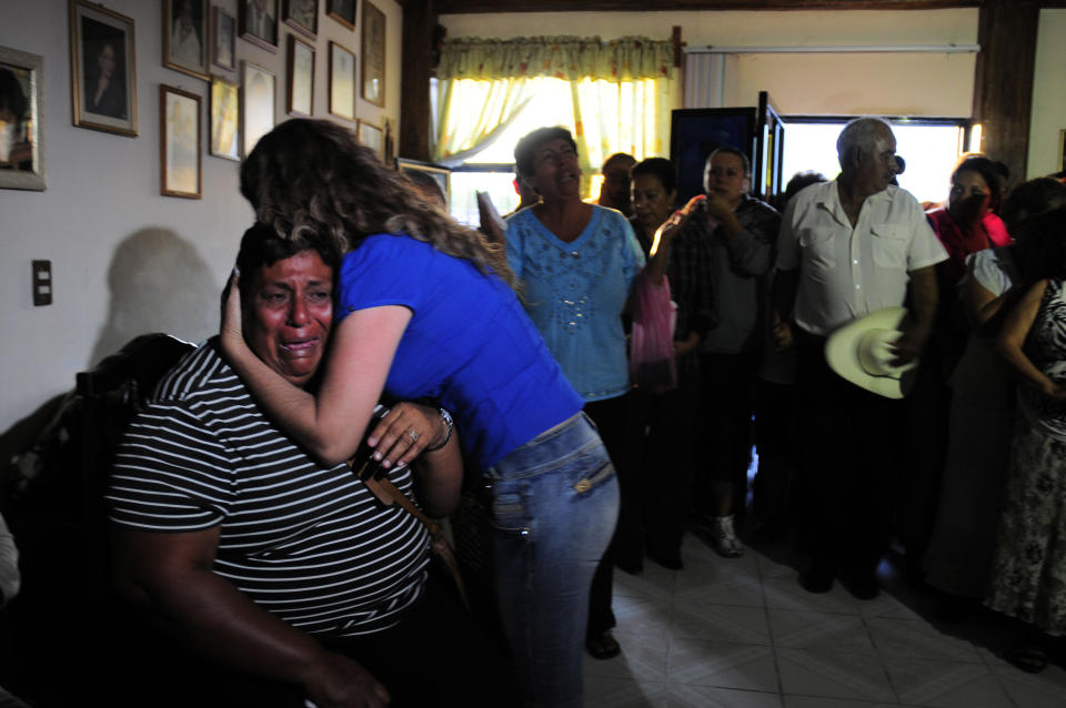 Edelmira Arias is comforted while weeping at the home of the parents of Texas death-row inmate Edgar Tamayo, her cousin, in Miacatlan, Mexico, Wednesday, Jan. 22, 2014. The U.S. Supreme Court rejected appeals Wednesday night for Mexican national Edgar Tamayo, clearing the way for the Texas death row inmate to be executed for the slaying of a Houston police officer 20 years ago. Secretary of State John Kerry previously asked Texas to delay Tamayo's punishment, saying it "could impact the way American citizens are treated in other countries." The State Department repeated that stance Wednesday. (AP Photo/Tony Rivera)