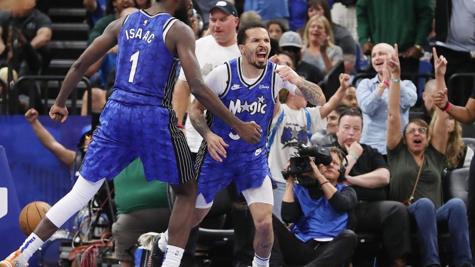 <div>Orlando Magic guard <a class="link " href="https://sports.yahoo.com/nba/players/6407/" data-i13n="sec:content-canvas;subsec:anchor_text;elm:context_link" data-ylk="slk:Cole Anthony;sec:content-canvas;subsec:anchor_text;elm:context_link;itc:0">Cole Anthony</a> (50) and center <a class="link " href="https://sports.yahoo.com/nba/players/5768/" data-i13n="sec:content-canvas;subsec:anchor_text;elm:context_link" data-ylk="slk:Jonathan Isaac;sec:content-canvas;subsec:anchor_text;elm:context_link;itc:0">Jonathan Isaac</a> celebrate late in the game against the Milwaukee Bucks at the Kia Center on Sunday, April 14, 2024, in Orlando, Florida. Orlando won the game 113-88 to clinch a playoff berth. (Stephen M. Dowell/Orlando Sentinel/Tribune News Service via Getty Images)</div>