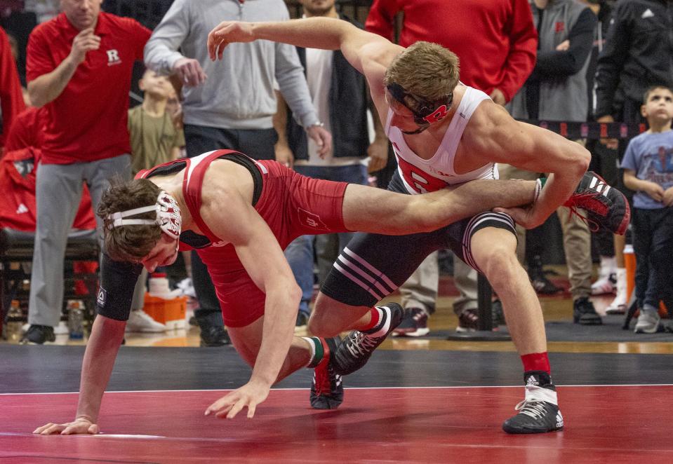 Rutgers' Al Desantis (right) recorded a key 9-0 win by major decision at 157 pounds in the Scarlet Knights' 30-11 win over Indiana Friday night in the Big Ten Conference opener.