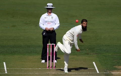 Moeen Ali bowls for England - Credit: getty images