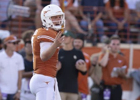 Oct 13, 2018; Austin, TX, USA; Texas Longhorns quarterback Shane Buechele (7) audibles against the Baylor Bears during the fourth quarter at Darrell K Royal-Texas Memorial Stadium. Mandatory Credit: John Gutierrez-USA TODAY Sports