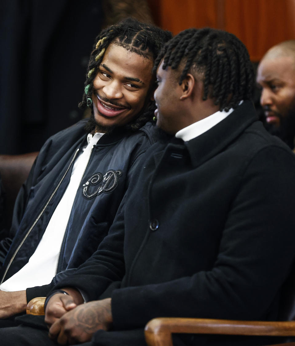 Memphis Grizzlies player Ja Morant, left, and friend Davonte Pack appear in Judge Carol Chumney's courtroom at Shelby County Circuit Court on Monday, Dec. 11, 2023, in Memphis, Tenn. The hearing is to determine whether Morant used self defense during a fight last summer at his home. (Mark Weber/Daily Memphian via AP)