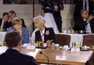 <p>German Chancellor Angela Merkel and IMF Managing Director Christine Lagarde wait for the arrival of President Donald Trump to the Gender Equality Advisory Council breakfast during the G-7 summit, Saturday, June 9, 2018, in Charlevoix, Canada. (Photo: Justin Tang/The Canadian Press via AP) </p>