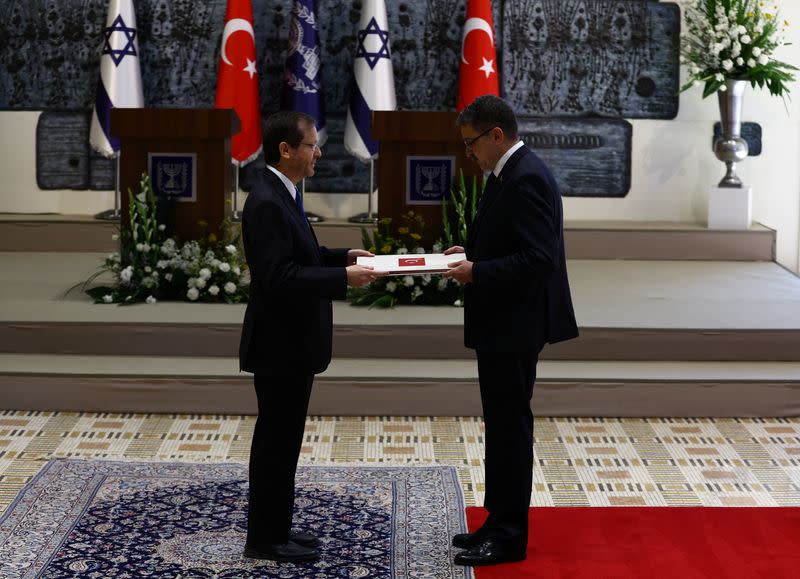 Turkey's new ambassador Torunlar presents his diplomatic credentials to Israel's President Herzog at the president's residence, in Jerusalem