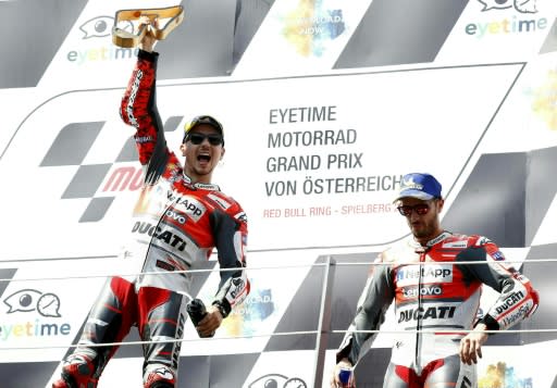 Jorge Lorenzo won a thrilling Austrian MotoGP while Ducati teammate Andrea Dovizioso could only finish third