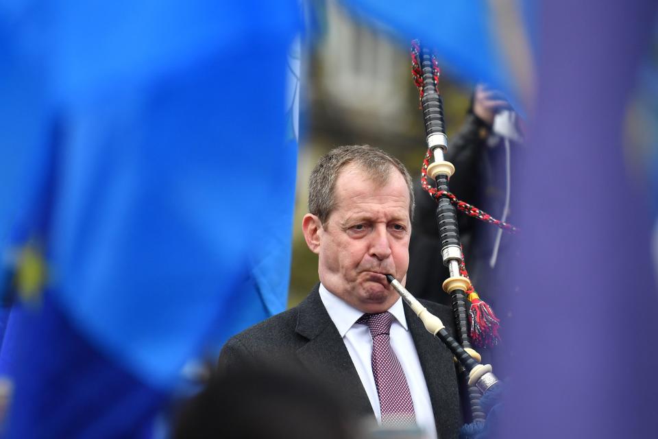 Alastair Campbell, former director of communications for Tony Blair plays the bagpipes as he demonstrates outside the Houses of Parliament in central London on April 8, 2019. - British Prime Minister Theresa May will meet with German and French leaders Angela Merkel and Emmanuel Macron as she scrambles to find a Brexit breakthrough ahead of Wednesday's crucial EU summit. (Photo by Ben STANSALL / AFP) (Photo by BEN STANSALL/AFP via Getty Images)