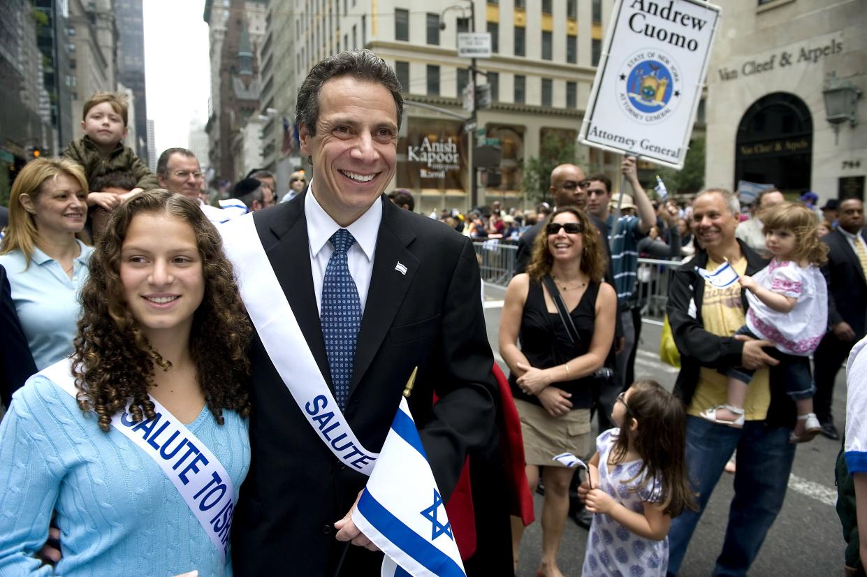 Democratic Gubernatorial Candidate Andrew Cuomo marches at the Salute to Israel parade with daughter Cara on May 23, 2010.