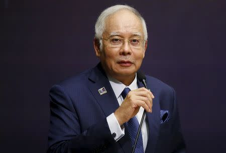 Malaysia's Prime Minister Najib Razak speaks at the opening of the International Conference on Deradicalisation and Countering Violent Extremism in Kuala Lumpur, Malaysia, January 25, 2016. REUTERS/Olivia Harris