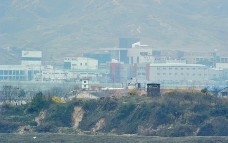 A North Korean guard post stands in front of the closed Seoul-funded industrial complex in Kaesong north of the border on April 23, 2013. South Korea says it has decided to withdraw all remaining staff from its joint industrial complex with North Korea for their own safety, after Pyongyang shunned an offer of formal talks