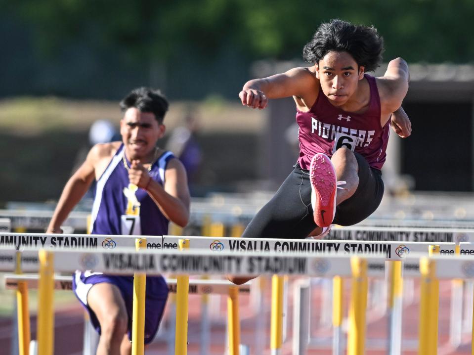 Mt. Whitney's Eric Gajdusek finishes first in the boys 110 high hurdles during the 2022 West Yosemite League high school track and field championships at Golden West on Wednesday, May 4, 2022. 