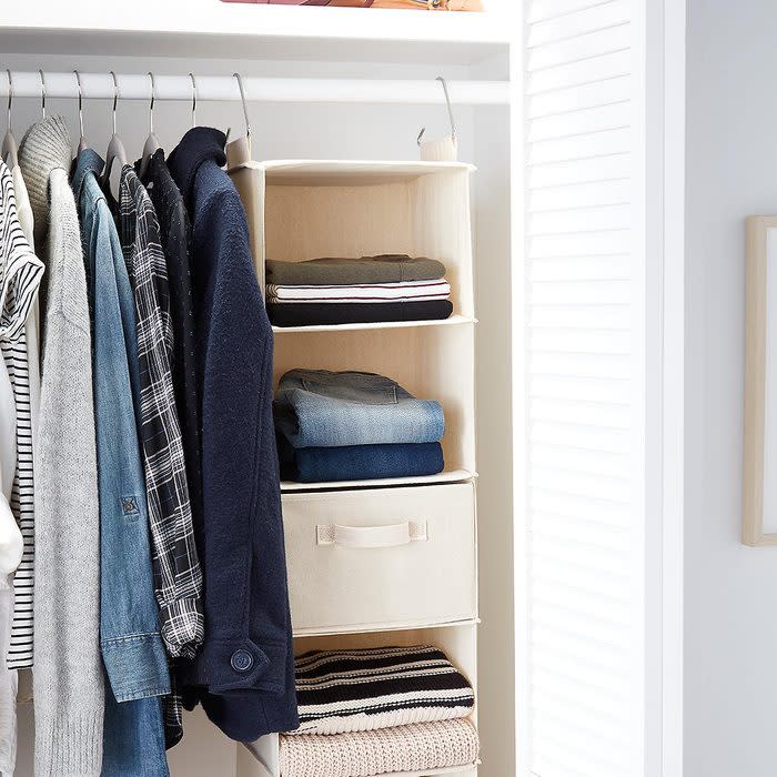 <a href="https://www.containerstore.com/s/closet/storage-hanging-bags/6_compartment-canvas-hanging-sweater-organizer/12d?productId=10005136" rel="nofollow noopener" target="_blank" data-ylk="slk:Hanging Organizer;elm:context_link;itc:0;sec:content-canvas" class="link rapid-noclick-resp">Hanging Organizer</a>