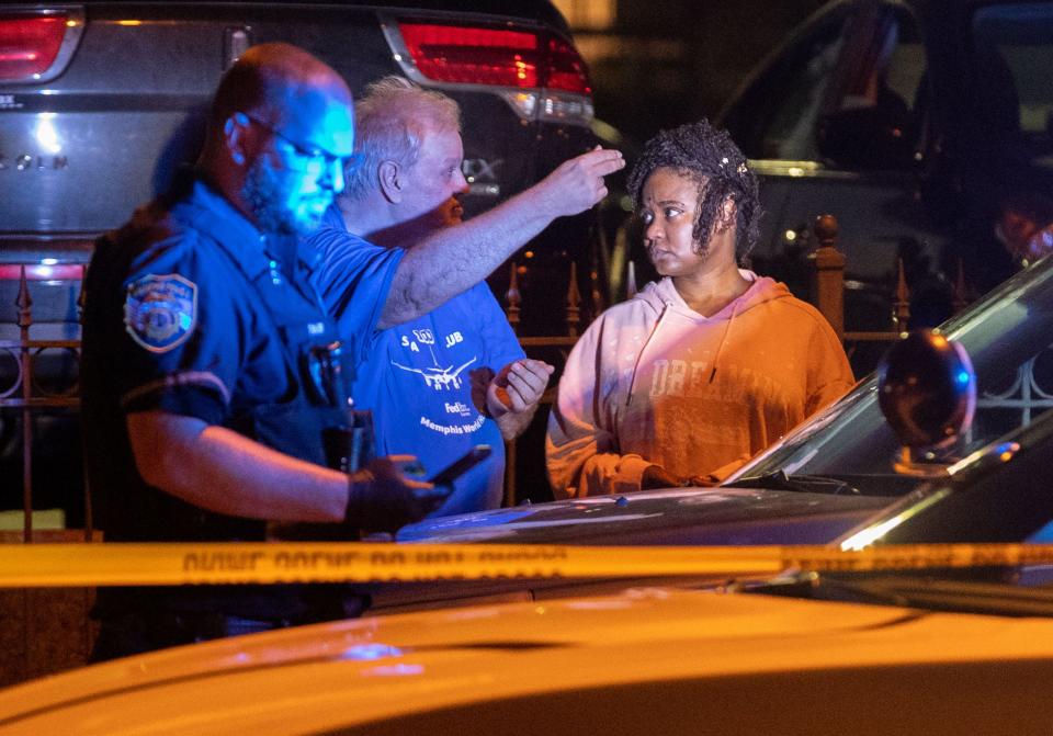 Memphis police officers work the scene of a shooting MPD believes was committed by a man driving around shooting Wednesday, Sept. 7, 2022, at McLean Boulevard between Poplar and Madison avenues.