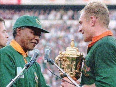 Mandela presented the Rugby World Cup to Francois Pienaar in 1995 (AP)