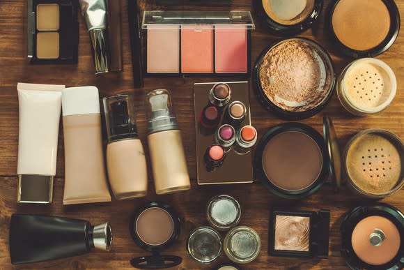 Assortment of makeup products on a desk