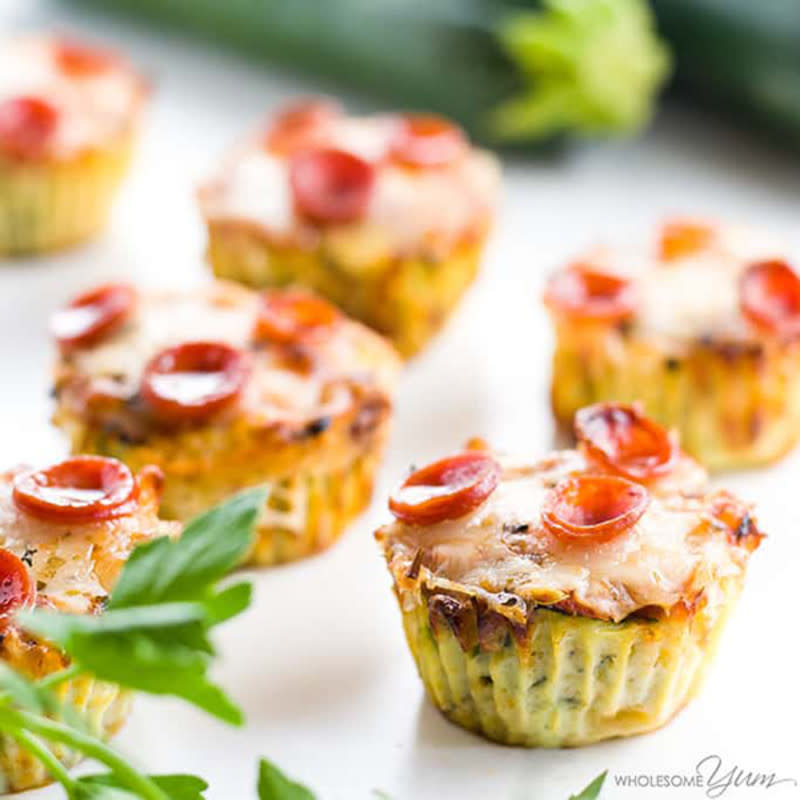 <p>Wholesome Yum</p><p>A delicious pizza-flavored appetizer that's great for lunch too!</p><p><strong>Get the recipe: <a href="https://www.wholesomeyum.com/recipes/zucchini-pizza-bites-recipe-low-carb-gluten-free/" rel="nofollow noopener" target="_blank" data-ylk="slk:Zucchini Pizza Bites Recipe;elm:context_link;itc:0;sec:content-canvas" class="link rapid-noclick-resp">Zucchini Pizza Bites Recipe </a></strong></p>