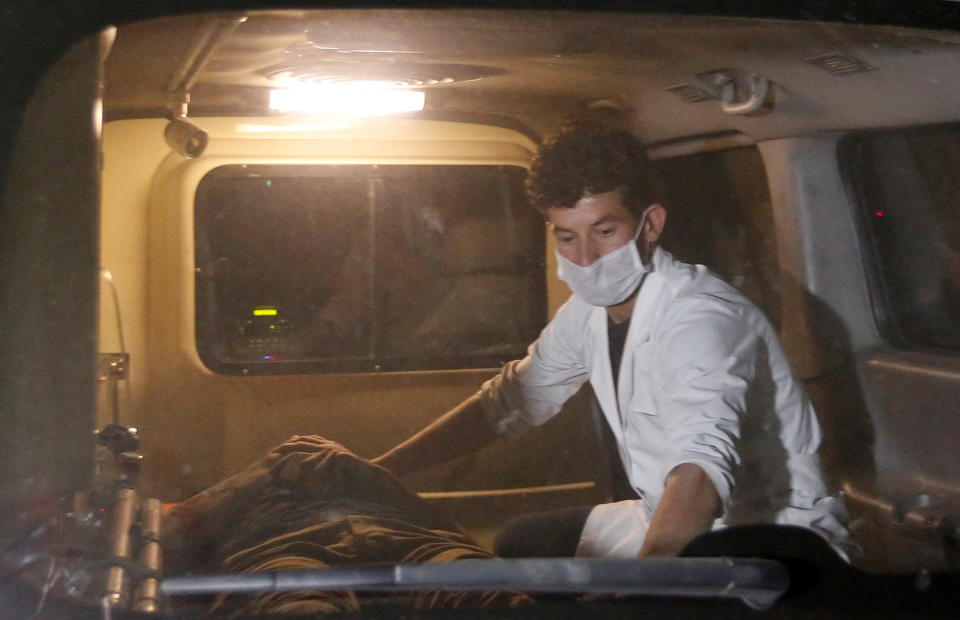 <p>A wounded man lies inside an ambulance following an attack at American University of Afghanistan in Kabul on Aug. 24, 2016. (REUTERS/Mohammad Ismail) </p>