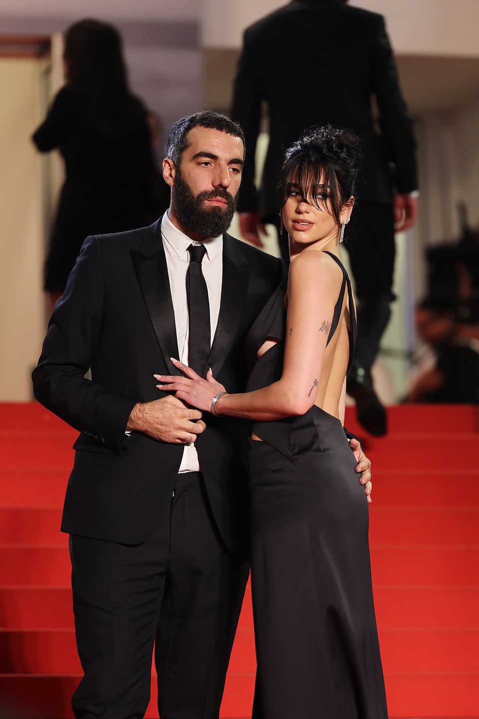 romain and dua pose on the red carpet