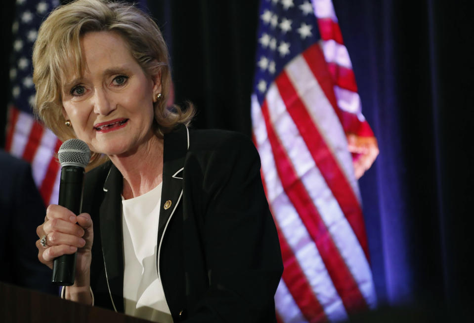 FILE - In this Nov. 27, 2018 file photo, Republican U.S. Sen. Cindy Hyde-Smith speaks to her supporters as she celebrates her runoff win over Democrat Mike Espy in Jackson, Miss. On Tuesday, Nov. 12, 2019, Espy announced another run for U.S. Senate, setting up a 2020 rematch with Hyde-Smith. (AP Photo/Rogelio V. Solis, File)