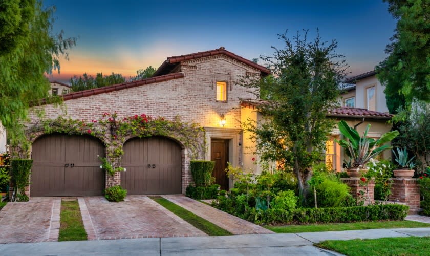 Built in 2003, the Spanish-style home in a gated community offers three bedrooms and 2.5 bathrooms in 2,300 square feet.