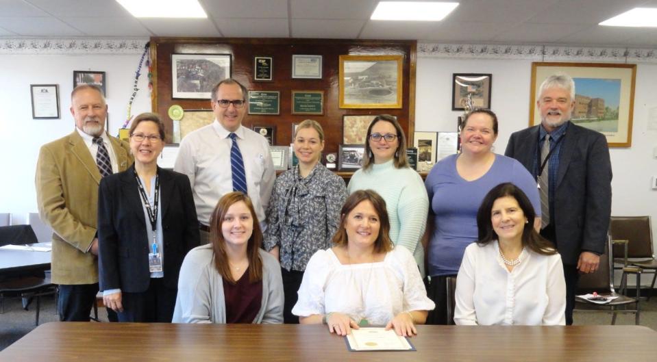 Jennifer Meagher was lauded by the Wayne County Commissioners, January 5, for her exemplary performance during her first five years serving as Judicial Secretary and Jury Manager in the Wayne County Court of Common Pleas. Seated from left: Laura Hooker, Court Reporter; Jennifer Meagher; Judge Janine Edwards. Standing: Commissioners Brian Smith and Joceyln Cramer; Judge Matthew Meagher; Chloe Romanowski, Law Clerk; DJ Savage, Deputy Court Administrator; Nicole Hendrix, Court Administrator and Commissioner James Shook.