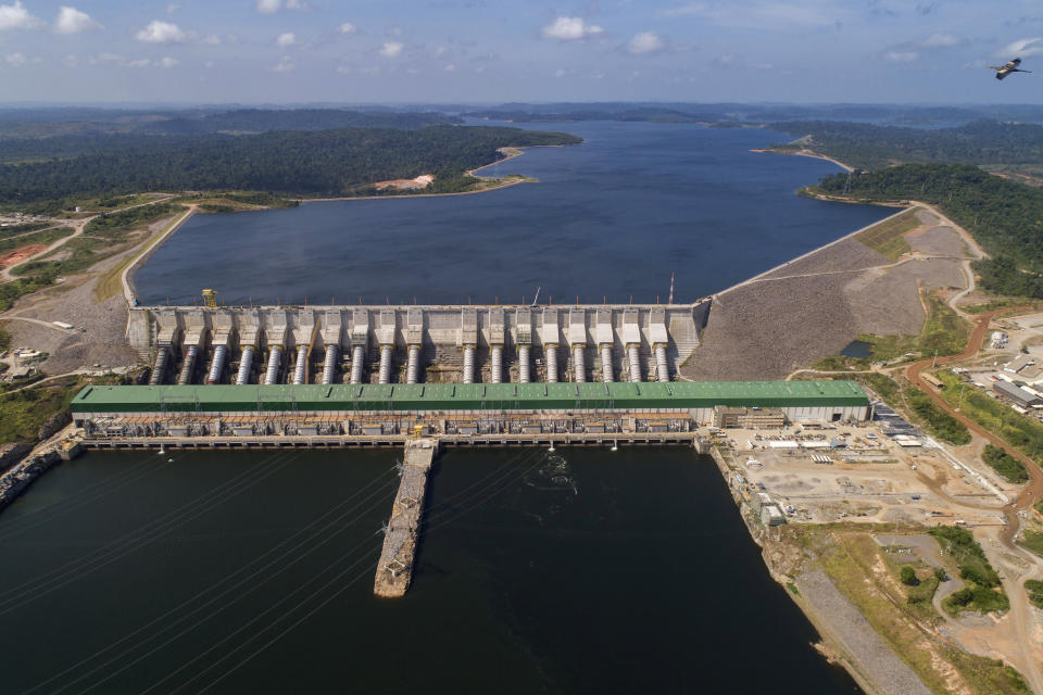 FILE - The Belo Monte hydroelectric dam stands in the Xingu River in Altamira, Para state, Brazil, Sept. 6, 2019. (AP Photo/Andre Penner, File)