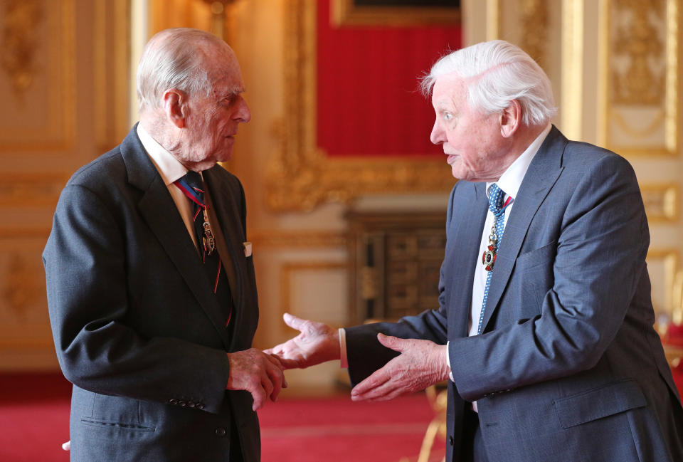 WINDSOR, ENGLAND - MAY 7: Members of the Order of Merit, Prince Philip, Duke of Edinburgh (L) and Sir David Attenborough speak ahead of a luncheon at Windsor Castle on May 7, 2019 in Windosr, England. Established in 1902 by King Edward VII, The Order of Merit recognises distinguished service in the armed forces, science, art, literature, or for the promotion of culture. Admission into the order remains the personal gift of The Queen and is restricted to a maximum of 24 living recipients from the Commonwealth realms, plus a limited number of honorary members. (Photo by Jonathan Brady - WPA Pool/Getty Images)