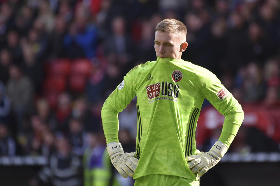 Sheffield United's goalkeeper Dean Henderson reacts during the English Premier League soccer match between Sheffield United and Liverpool at Bramall Lane in Sheffield, England, Saturday, Sept. 28, 2019. (AP Photo/Rui Vieira)