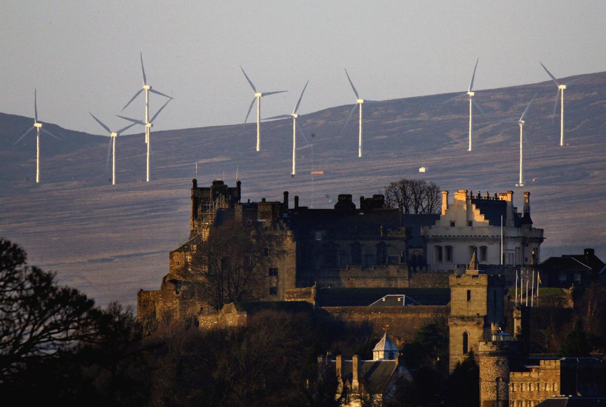 Wind turbines on hills behind Stirling Castle: Getty