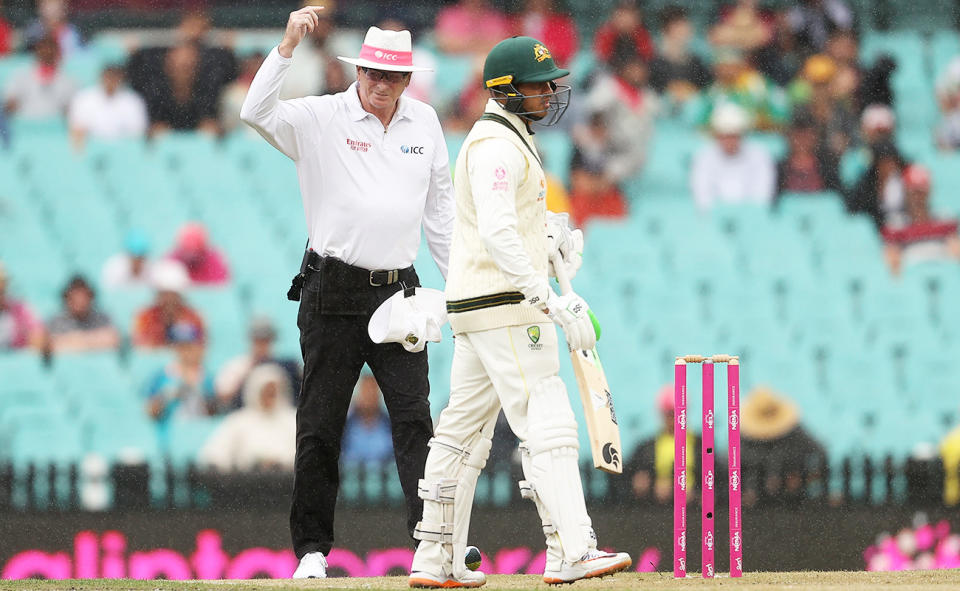 Usman Khawaja, pictured here as rain disrupts play in the third Test at the SCG.